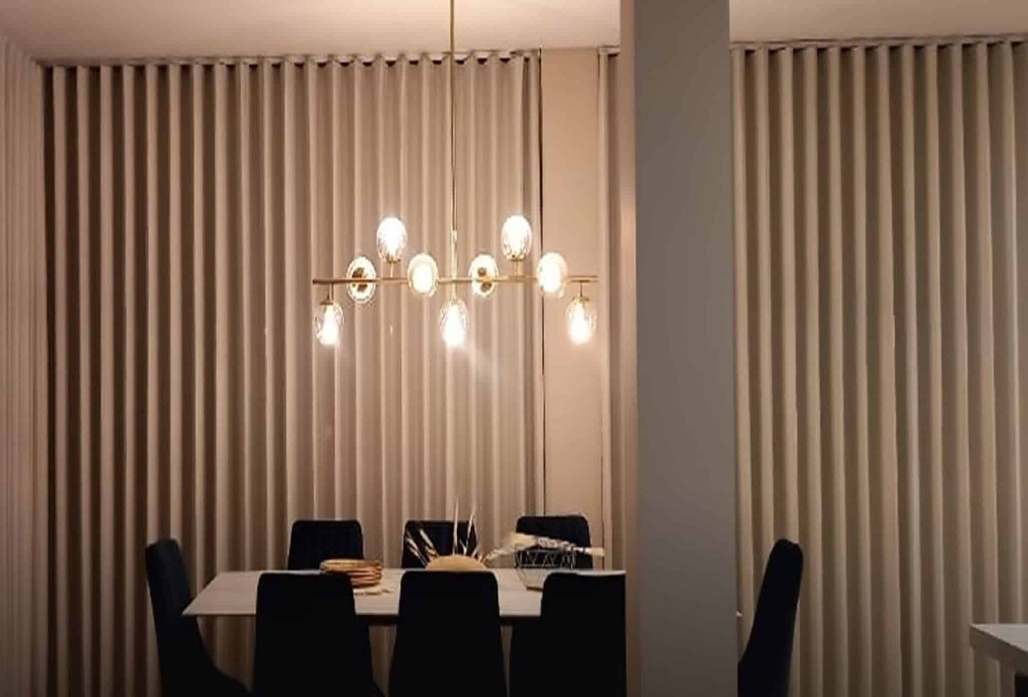 Venta de cortinas de ondas modernas con rieles decorativos en Medellín.